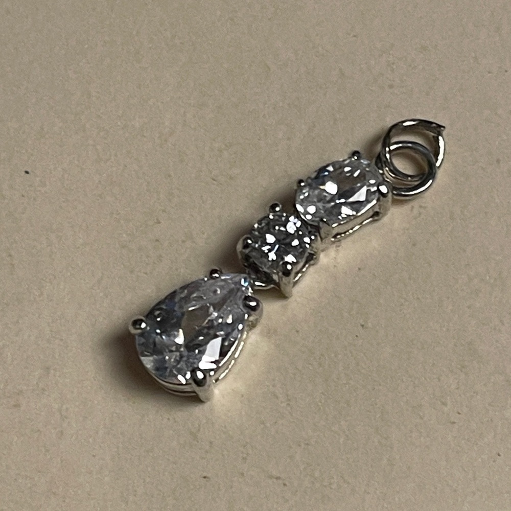 Elegant Silver Pendant with Clear Stones